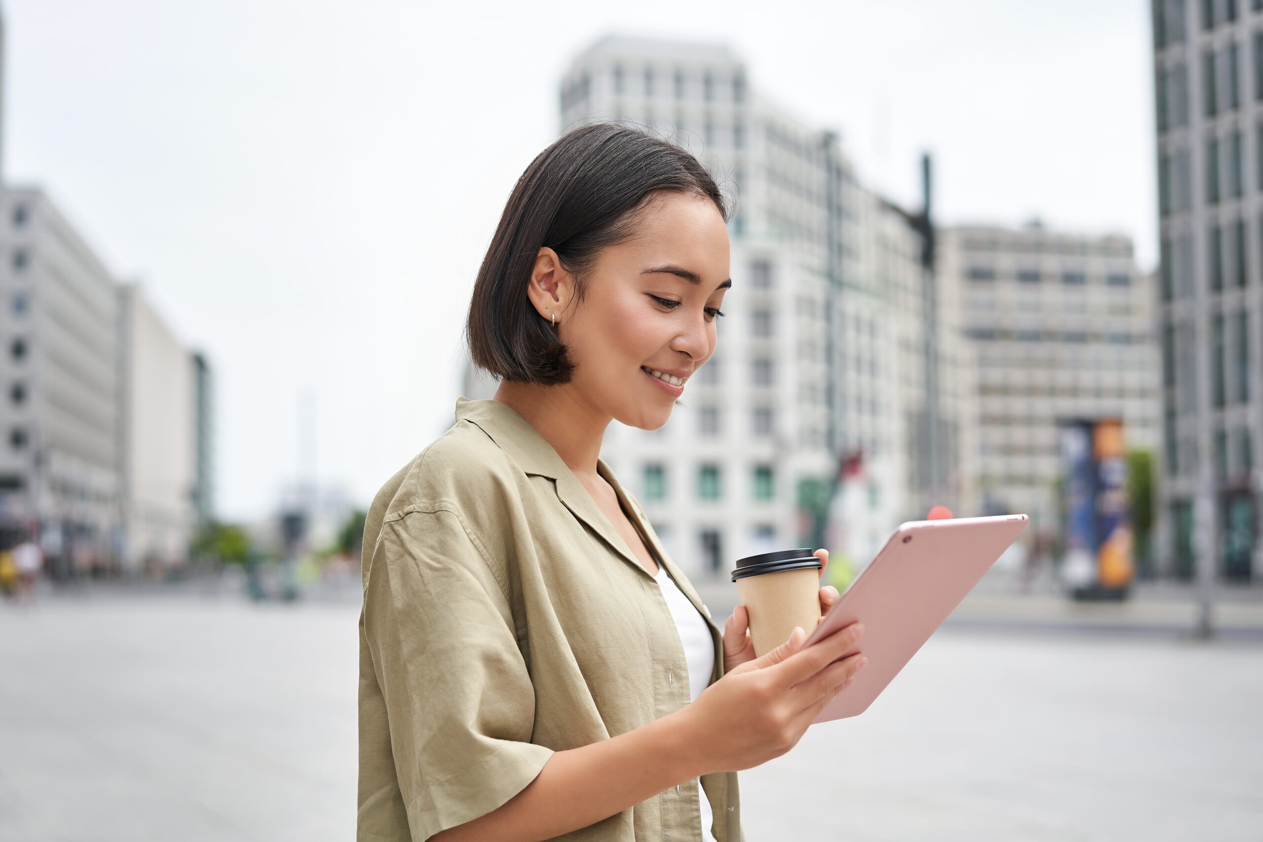 Woman using smartphone for communication or customer service
